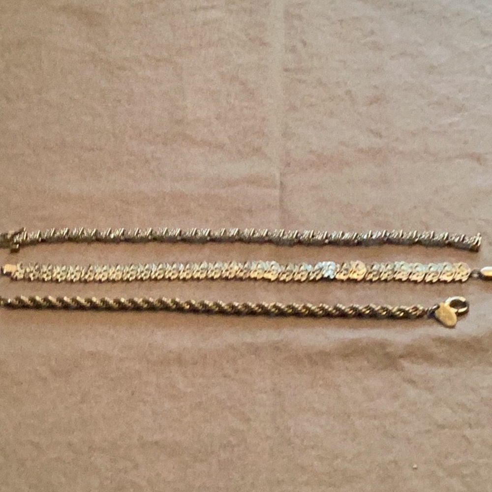 3 12” gold plated bracelets. Very nice, some with custom.